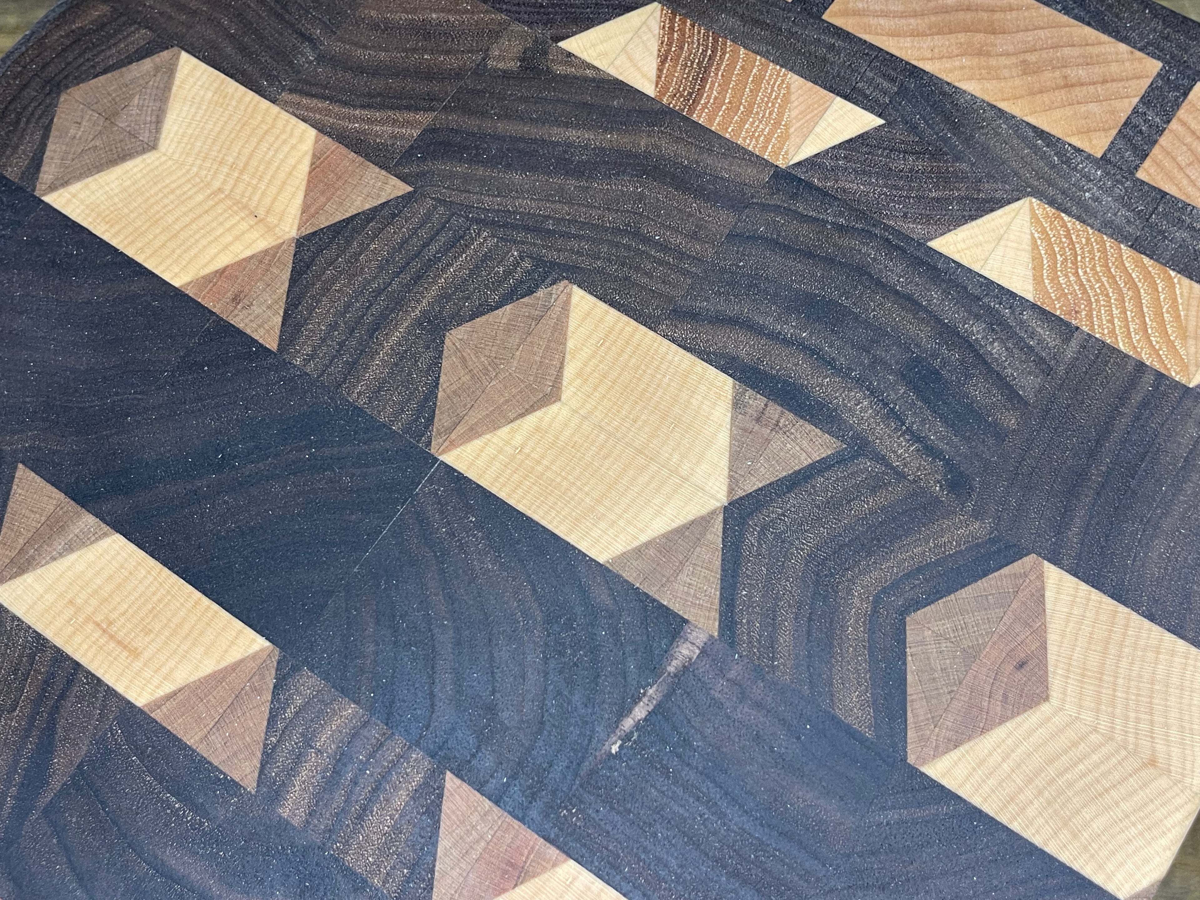 Geometric pattern walnut cutting board
